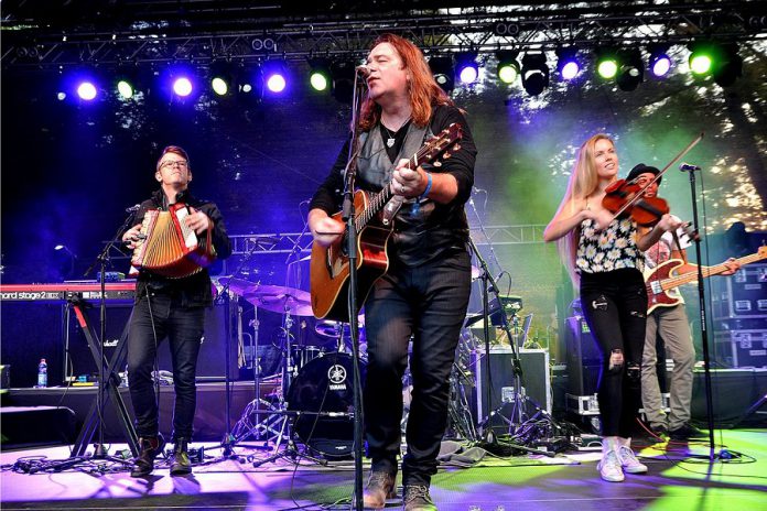 Alan Doyle, pictured here with his band at the 2017 Blacksheep Festival in Germany, performs a free concert at Peterborough Musicfest in Del Crary Park in Peterborough on August 8, 2018. (Photo: Ralf Schulze / rs-foto.de)
