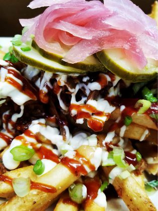  Pulled pork poutine from the Angle Iron Kitchen food truck, owned  and operated by Chef Brian Henry. (Photo: Angle Iron Kitchen / Facebook)