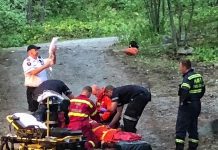 Barry Killen captured this scene of a rescue in Kawartha Highlands Provincial Park of a camper who was injured when a piece of equipment containing flammable liquid exploded at her remote campsite on Shark Lake. The woman, who suffered burns to areas of her body, was later airlifted by helicopter to Peterborough Regional Health Centre. (Photo: Barry Killen)