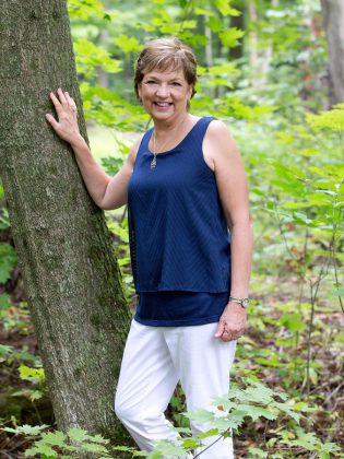 Cora Whittington exemplfies her coaching style: she transformed her personal struggles with adversity into building an award-winning retreat centre and B&B called Golden Pathways. Her real-life experience still motivates her to help others make the shift into new possibilities and opportunities. (Photo: Miranda Studios)