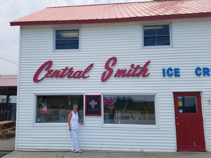 Jenn Scates outside the Central Smith Creamery outlet at 739 Lindsay Road in Selwyn. If you're dropping by for a cone in the summer, you can't miss the big red roof! (Photo: Heather Doughty)
