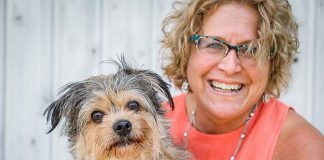 Susan Dunkley, Manager of Development and Outreach at the Peterborough Humane Society, with Chewy. A natural organizer, planner, and multitasker, Susan's high level of energy serves her well when working with the team at the Peterborough Humane Society as they work towards their making a state-of-the-art facility on Technology Drive a reality. (Photo: Heather Doughty)