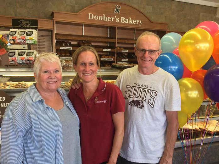 The family-run Dooher's Bakery in Campbellford has been voted the "Sweetest Bakery in Canada" in a nationwide contest sponsored by Dawn Food Products. Pictured is owner Cory Dooher (centre) with her proud parents Christine and Peter. (Photo: Dooher's Bakery / Facebook)