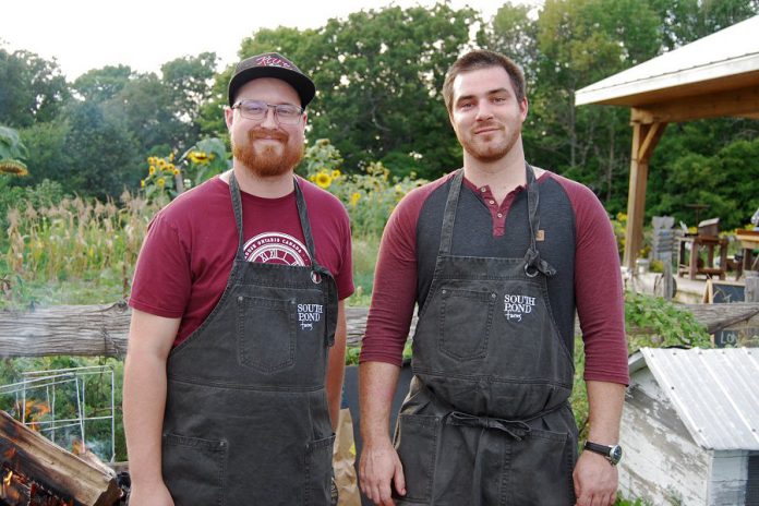 Chef Riley Wanke of South Pond Farms (right), accompanied by Tyler from Rare Grill House in Peterborough, created  a unique Squash "Porchetta", a vegetarian take on an Italian meat dish, for the seventh course at the  (Photo: April Potter / kawarthaNOW.com)