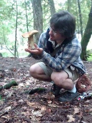 Mushroom instructor Luke Eckstein examines a bolete. (Photo: Luke Eckstein)