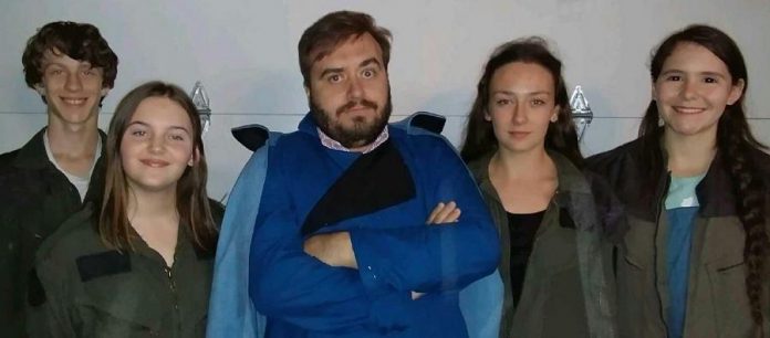 Planet 12's company will recreate the roles from the original TV series: George Knechtel as Lt. P'ol J'erom, Emma Meinhardt as Captain Christine Gentry, Adam Martignetti as Commander Isaac Gampu, Abbie Dale as Lt. Laura Gentry, and Sam Weatherdon as Medical Officer Tee Gar Soom. (Photo courtesy of Planet 12 Productions)