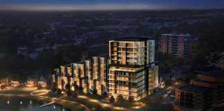 A nightime rendering of Ashburnham Realty's proposed new luxury condo development on Crescent Street on the shores of Little Lake in Peterborough. (Supplied image)