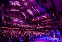 Choir! Choir! Choir! co-founders Nobu Adilman and Daveed Goldman on stage at Massey Hall in Toronto. Adilman and Goldman will lead an audience at Market Hall in Peterborough in a performance of Leonard Cohen's "Hallelujah" (and more) on October 5, 2018. (Photo: Joseph Fuda)