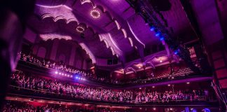 Choir! Choir! Choir! co-founders Nobu Adilman and Daveed Goldman on stage at Massey Hall in Toronto. Adilman and Goldman will lead an audience at Market Hall in Peterborough in a performance of Leonard Cohen's "Hallelujah" (and more) on October 5, 2018. (Photo: Joseph Fuda)