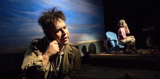 Herbie Barnes as Arthur Copper and Tracey Hoyt as Maureen Poole in the original Tarragon Theatre production of "Cottagers and Indians", Drew Hayden Taylor's light-hearted exploration of the real-life conflict between cottagers objecting to the production of wild rice in Pigeon Lake by James Whetung of Curve Lake First Nation. Barnes will reprise his role, with Brooke Johnson taking on the role of Maureen, in the touring version of the play, which will be performed at Curve Lake First Nation, Bobcaygeon, and Peterborough in October and November. (Photo: Cylla von Tiedemann)