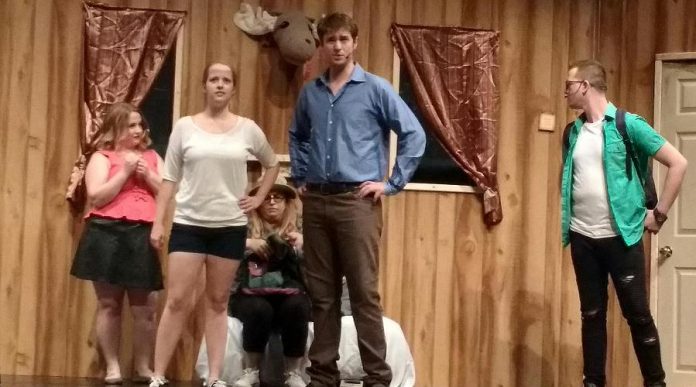 Five college students on spring break (Hillary Dumoulin as Shelly, Sophie Robinson as Linda, Meg O'Sullivan as Cheryl, Andrew Little as Ash, and Brandon Humphrey as Scott) stay in an old cabin in the woods, where they awaken demons. (Photo: Sam Tweedle / kawarthaNOW.com)