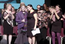 As several of the 54 women who received leadership awards applaud, Sister Ruth Hennessey accepts the Lifetime Achievement Award from Peterborough-Kawartha MP and Minister of Status of Women Maryam Monsef at the inaugural Peterborough-Kawartha Women's Leadership Awards, held on October 27, 2018 at Showplace Performance Centre in downtown Peterborough. (Photo: Bruce Head / kawarthaNOW.com)