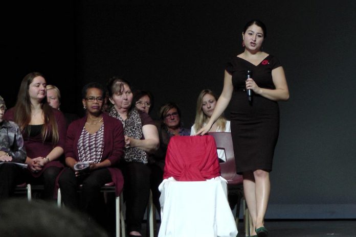 The empty chair on the stage symbolized all the women who could not be there because they are struggling to keep their families safe and fed or dealing with hardships. (Photo: Bruce Head / kawarthaNOW.com)