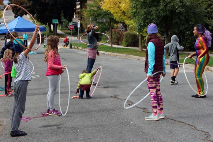 At two recent Pulse Pop-ups in Peterborough's East City, Sharleen from Boho Fab (far right) led attendees in hula hoop activities along with whimsical hoop performances for residents to enjoy. (Photo: Karen Halley)