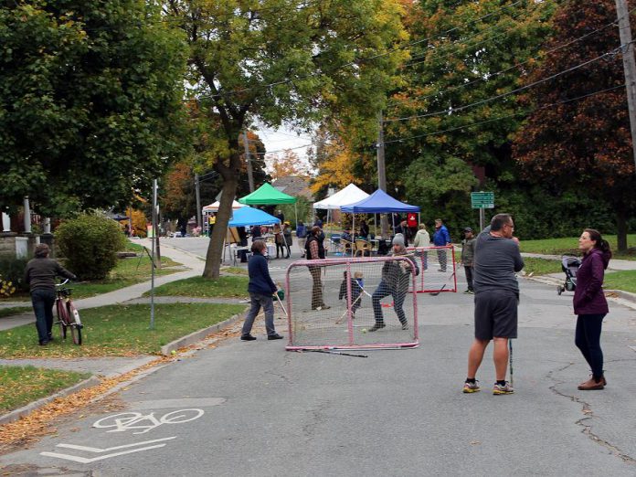 Neighbours on Sophia Street planned activities for all ages to enjoy during their recent Pulse Pop-up, including street hockey, bike riding, live music, and a neighbourhood potluck. (Photo: Karen Halley)