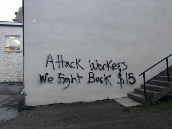 Vandals spray painted "Attack Workers We Fight Back $15" on a wall outside of Haliburton-Kawartha Lakes-Brock MPP and Minister of Labour Laurie Scott's constituency office in downtown Lindsay near midnight on October 23, 2018. The vandals also smashed the glass in the office's door and front window, entered the office and overturned furniture and caused other damage. (Photo: Office of the Premier)