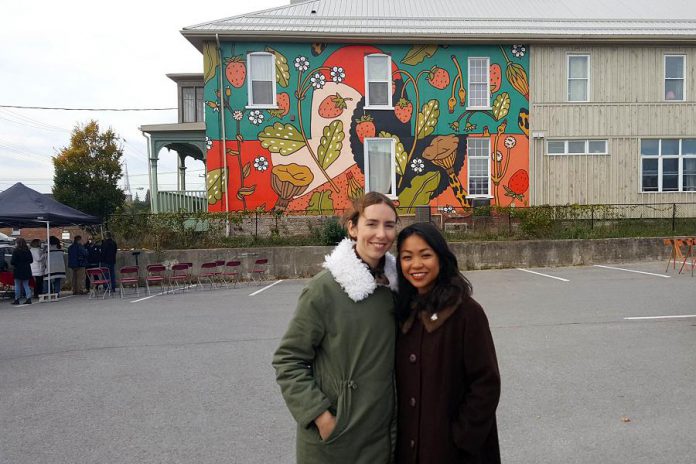 Toronto-based artists Caitlin Taguibao and Andrea Manica in front of their creation. (Photo: Jeannine Taylor / kawarthaNOW.com)