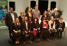 The recipients of the 2018 Kawartha Chamber of Commerce & Tourism's Awards of Excellence on stage at Bryan Jones Theatre at Lakefield College School on November 8, 2018. Cindy Windover (front row, third from left) was named Citizen of the Year. (Photo: Jeannine Taylor / kawarthaNOW.com)