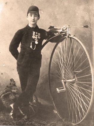 The Peterborough Cycling Club is one of the oldest cycling clubs in Canada. Pictured is member Alex Gibson with his high wheel bike and medals. (Photo courtesy of Lorne Shields via  The Bicycle Museum)