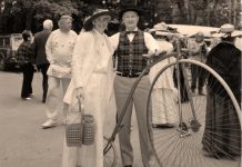 Dr. Wilbert Willoughby Belch with his replica penny-farthing "high wheel" bicycle in 1967 at Canada's centennial celebration in Jackson Park in Peterborough. You can see the replica bike as part of the The Bicycle Museum's pop-up exhibit at the Peterborough Public Library, which opens on December 3, 2018 and runs until January. (Photo courtesy of The Bicycle Museum)