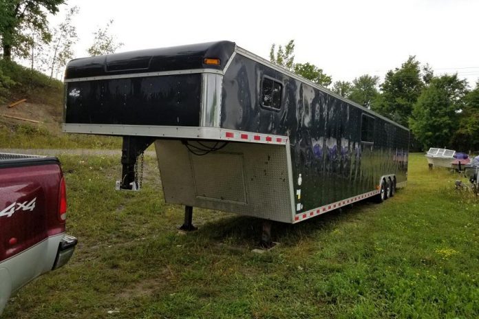 In addition to two race cars, the stolen 2006 black Pace PRG car trailer also contained various auto parts and equipment. The total value of the stolen items is $300,000. (Supplied photo)