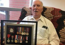 Fairhaven resident Joe Sullivan, 98, displays a montage of medals related to his war service. Sullivan was one of the Canadian assault troops in the 3rd Canadian Division of the Canadian Army who landed on Juno Beach in Normandy during the Allied invasion of German-occupied France on D-Day, June 6, 1944, which led to the liberation of Europe from Nazi occupation on May 8, 1945. In 2015, Joseph Sullivan was awarded the French National Order of the Legion of Honour (bottom left) in recognition of his war service. (Photo: Paul Rellinger / kawarthaNOW.com)