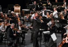 Maestro Michael Newnham leads the Peterborough Symphony Orchestra, the Kawartha Youth Orchestra, and audience members in the PSO's annual holiday carol sing-along in 2017. The Kawartha Youth Orchestra and the carol sing-along return in this year's holiday concert, "Home for the Holidays", which will be performed on Saturday, December 9th at Showplace Performance Centre in downtown Peterborough. (Photo: Huw Morgan)