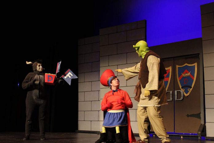 Lindsay Barr as Donkey, Taylor Beatty as Lord Farquuad, and Rowan Lamoureaux as Shrek. (Photo: Nate Axcell)