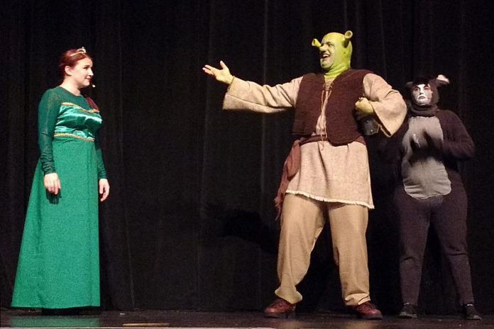 The unlikely trio of "Shrek: The Musical": Elizabeth Moody as Princess Fiona, Rowan Lamoureaux as Shrek, and Lindsay Barr as Donkey. The St. James Players production of the Tony-nominated musical runs from November 8 to 17 at Showplace Performance Centre in downtown Peterborough. (Photo: Sam Tweedle / kawarthaNOW.com)