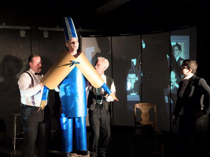 In "Unexploded Ordnance", Ryan Kerr (costumed) incorporates the radical Dada avant-garde art movement, which developed as a reaction to World War I.  Musicians Matt Greco and Curtis Driedger and performer Eryn Lidster also appear in the play. (Photo: Andy Carroll for Public Energy)