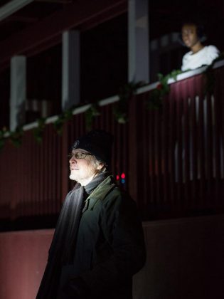 Robert Winslow as the bigoted Ebbie Krank, with Mosun Fadare as the mysterious woman Angela who sets the play's events into motion. Riffing on "A Christmas Carol", Beverley Cooper's script is ultimately a Christmas tale of redemption. (Photo: Wayne Eardley, Brookside Studio)