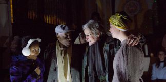 In "The Other: A Strange Christmas Tale", Leanne (Jalen Brink, left) is the daughter of Bill (Danny Waugh, second from left) and Judy (Naomi Duvall, right), who is estranged from her bigoted father Ebbie Krank (Robert Winslow, second from right). When a mysterious woman arrives in the Village of Millbrook, Ebbie is taken on a journey through his past, present, and future to understand the causes of his racism. (Photo: Wayne Eardley, Brookside Studio)