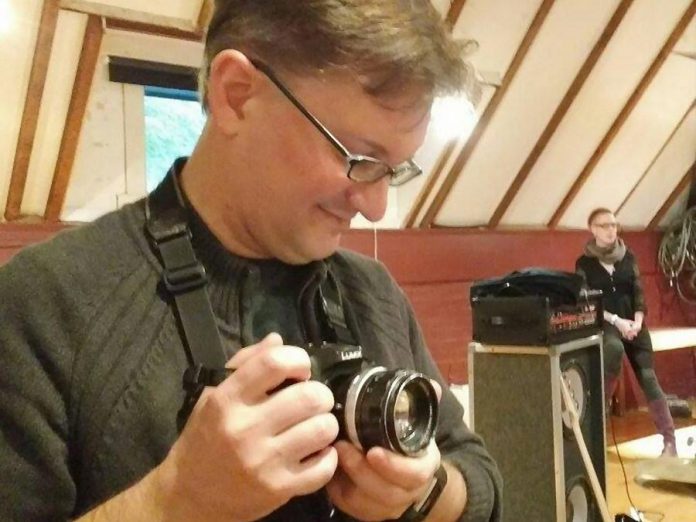 A rare photo of photographer Andy Carroll, who prefers to work behind the lens. (Photo courtesy of Jill Stavely)