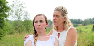 Grace Thompson as 15-year-old Serena with Cynthia Ashperger as her mom Ramona in Judith Thompson's play "Who Killed Snow White?" at the Winslow Farm in Millbrook. The controversial departure from 4th Line Theatre's usual historical fare was one of the best theatrical productions of 2018 according to kawarthaNOW's theatre reviewer Sam Tweedle. (Photo: Heather Doughty / kawarthaNOW.com)