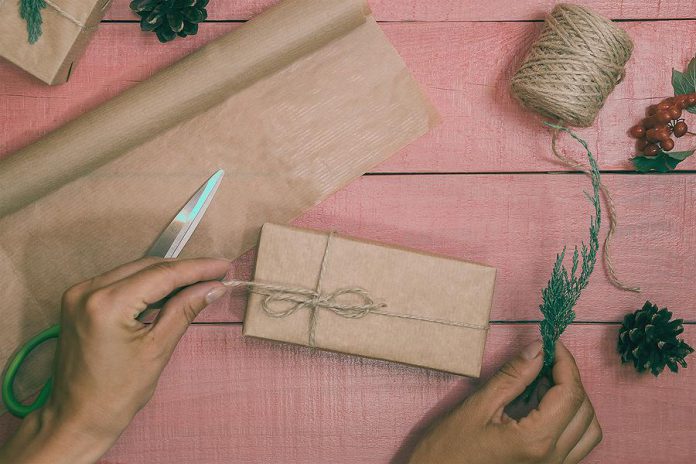 Rethinking your gift wrapping to include natural, recyclable, compostable, and reusable items like pine cones, twine, and kraft paper will help you to reduce holiday waste and your environmental impact this holiday season.