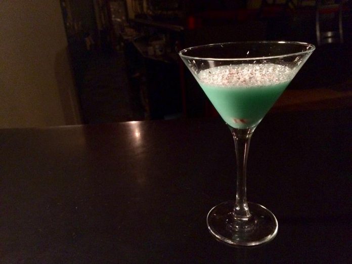 The Sapphire Room's most popular seasonal cocktail, The Silent Night is a blend of crème de menthe, crème de cacao and eggnog with a peppermint kiss shaved over top. (Photo: Eva Fisher / kawarthNOW.com)