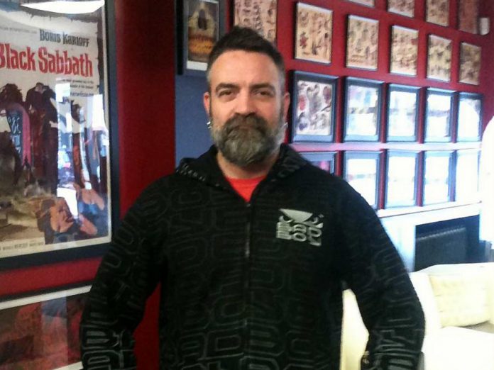 Mike Andrews in 2013, when we interviewed him as part of a series profiling successful businesses along Water Street in downtown Peterborough. (Photo: Carol Lawless / kawarthaNOW.com)