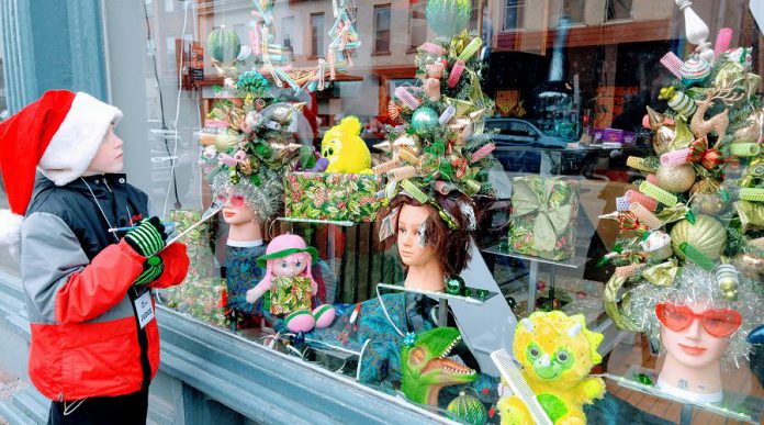 Beauty salon Union Studio won the 2018 Holiday Window Contest sponsored by the Peterborough DBIA for this creative display of vintage hair products as Christmas trees. (Photo courtesy of Peterborough DBIA)