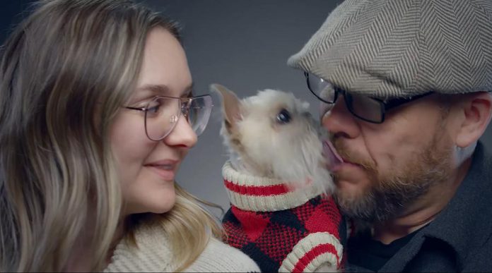 As Lisa Besseling looks on, Owen the Griff gives Marlon Hazlewood a kiss. (Screenshot)