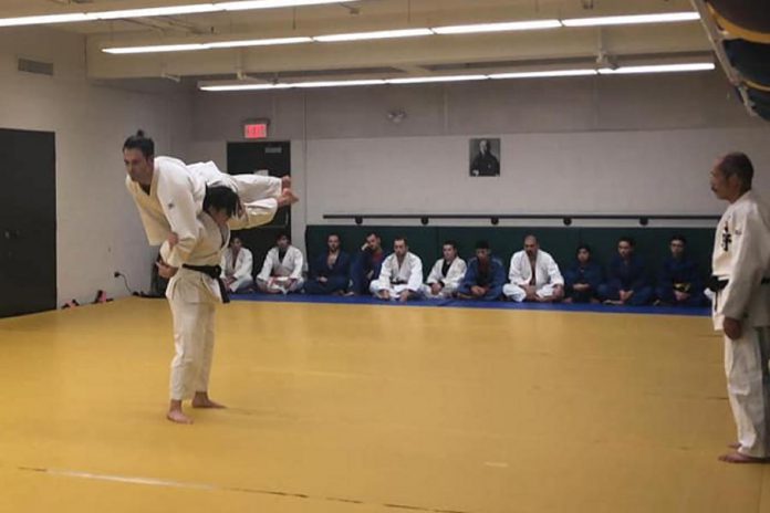 Sarah Miller demonstrates nage no kata ("forms of throwing") with sensei (instructor) Paul Teleki, who is Sarah's uke (training partner), as sensei Tom Hino looks on. (Supplied photo)