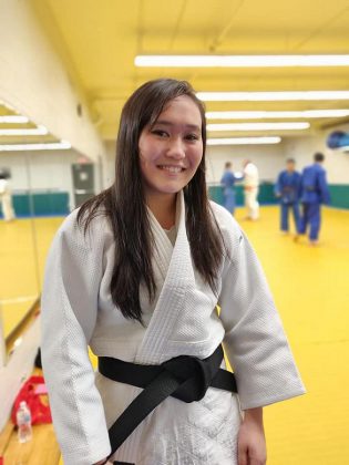 Sarah Miller displaying her first degree black belt in judo. She began practicing judo when she was three years old, and began competing when she was four years old. She won a bronze medal at the 2012 Canadian Judo Championships.  (Supplied photo)