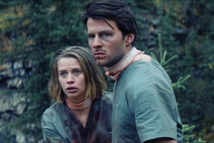 Thomas Cocquerel and Camille Stopps in the survival horror film "Alive", which screens at the Market Hall on March 1, 2019. (Photo courtesy of Blood in the Snow)