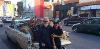 Catalina Motta with Blue Rodeo's Greg Keelor in September 2016, after Keelor purchased some vintage furniture from Motta's temporary store on Water Street. A little more than a year after closing Catalina's, her combination hair salon, vintage store, and licensed live performance space on Hunter Street West, Motta is launching a new vintage market and art studio space on Water Street called House Of Commons Vintage Market on February 1, 2019. (Photo: Megan Walker)
