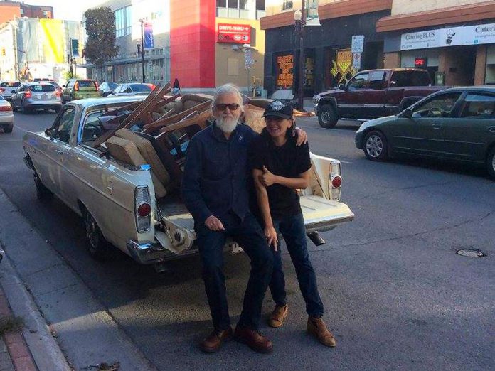 Catalina Motta with Blue Rodeo's Greg Keelor in September 2016, after Keelor purchased some vintage furniture from Motta's temporary store on Water Street. A little more than a year after closing Catalina's, her combination hair salon, vintage store, and licensed live performance space on Hunter Street West, Motta is launching a new vintage market and art studio space on Water Street called House Of Commons Vintage Market on February 1, 2019. (Photo: Megan Walker)