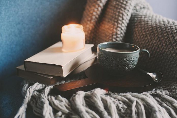 Hygge can include getting cozy with a book, a blanket, and a hot drink while creating a warm atmosphere with candles. Beeswax candles burn cleaner than other choices, and do not release irritating toxins or fragrances that paraffin candles can contain.