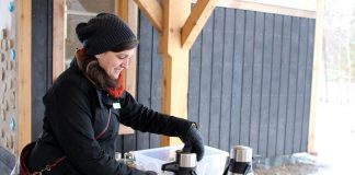 The Danish concept of "hygge" (pronounced "hue-gah") is about embracing the coziness of the winter season, which can include cuddling up with a blanket and a hot drink at home or heading outside to enjoy nature. GreenUP's Lindsay Stroud combines both at GreenUP Ecology Park with some treats of warm cider and homemade cookies. (Photo: Karen Halley)