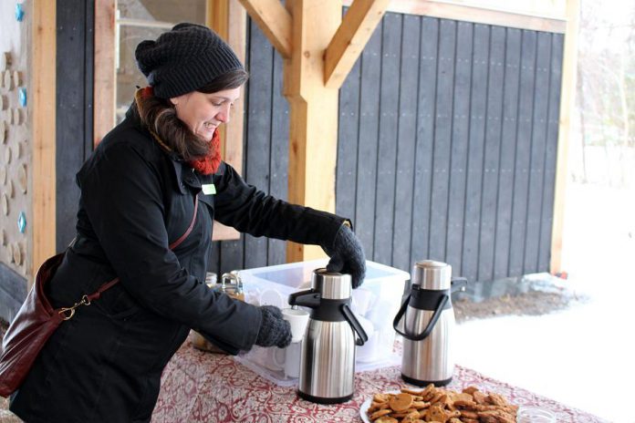 The Danish concept of "hygge" (pronounced "hue-gah") is about embracing the coziness of the winter season, which can include cuddling up with a blanket and a hot drink at home or heading outside to enjoy nature. GreenUP's Lindsay Stroud combines both at GreenUP Ecology Park with some treats of warm cider and homemade cookies. (Photo: Karen Halley)