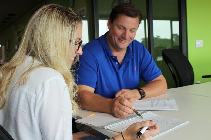 "We've helped our clients with sales, equity investments, loans, and grant. This economic impact motivates the staff and me to continue with the work we do in the community." Innovation Cluster CEO Michael Skinner pictured with a client.  (Photo: Innovation Cluster)