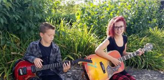 Siblings 14-year-old Amanda and 12-year-old John of Port Hope have only been playing and singing for a year, but are performing their first official gig at Ganarascals Restaurant in Port Hope on Saturday, January 12th. (Photo: Amanda and John / Facebook)