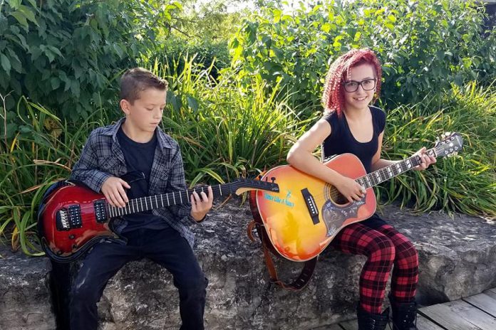 Siblings 14-year-old Amanda and 12-year-old John of Port Hope have only been playing and singing for a year, but are performing their first official gig at Ganarascals Restaurant in Port Hope on Saturday, January 12th. (Photo: Amanda and John / Facebook)